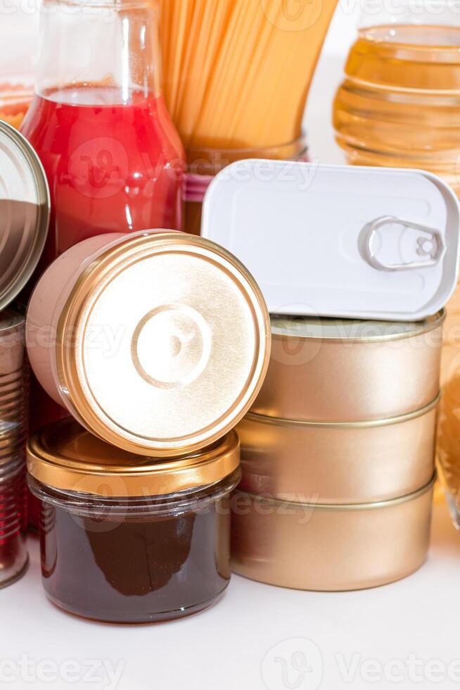 Food Reserves. Canned Food, Spaghetti, Tomato Juice, Pasta and Grocery. Emergency Food Storage in Case of Crisis. Strategic Food Supplies photo
