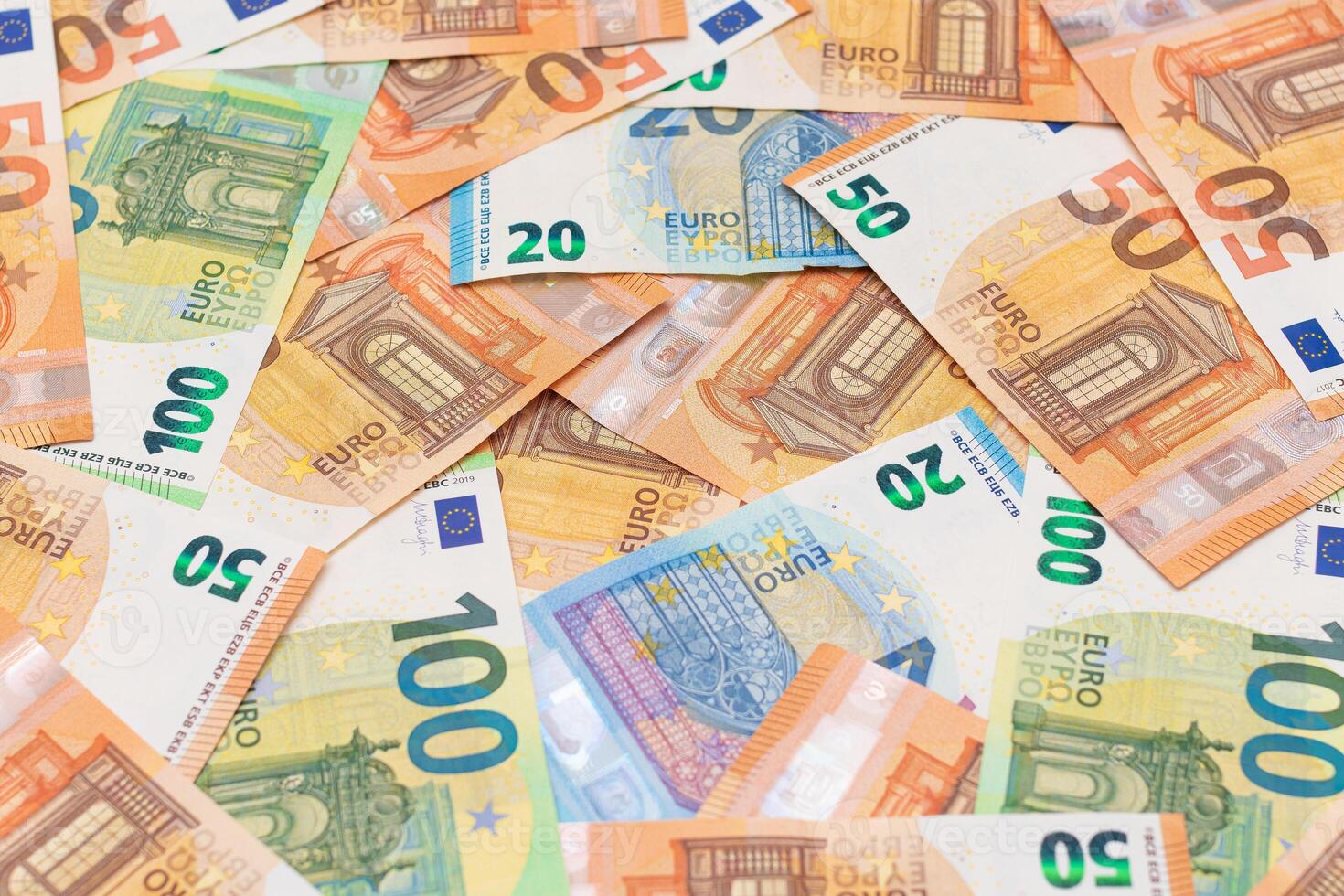 Different Euro Banknotes Money Background. Euro Money Currency. Colored Paper Money. A Lot of Fifty Euro Bills. Business, Finances, Cash and Money Saving Concept photo