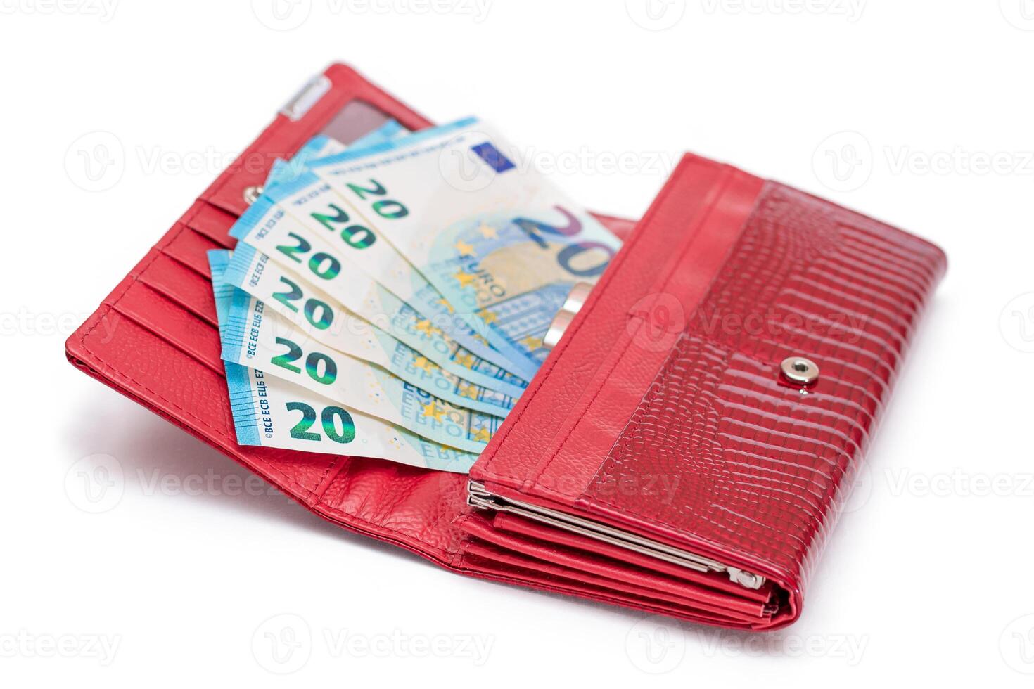Opened Red Women Purse with 20 Euro Banknotes Inside - Isolated on White Background. A Wallet Full of Money Symbolizing Wealth, Success, Shopping and Social Status - Isolation photo