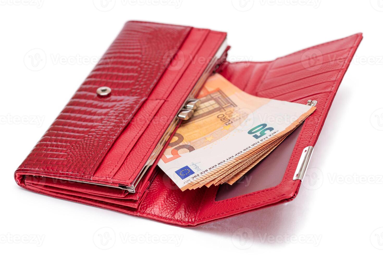 Opened Red Women Purse with 50 Euro Banknotes Inside - Isolated on White Background. A Wallet Full of Money Symbolizing Wealth, Success, Shopping and Social Status - Isolation photo