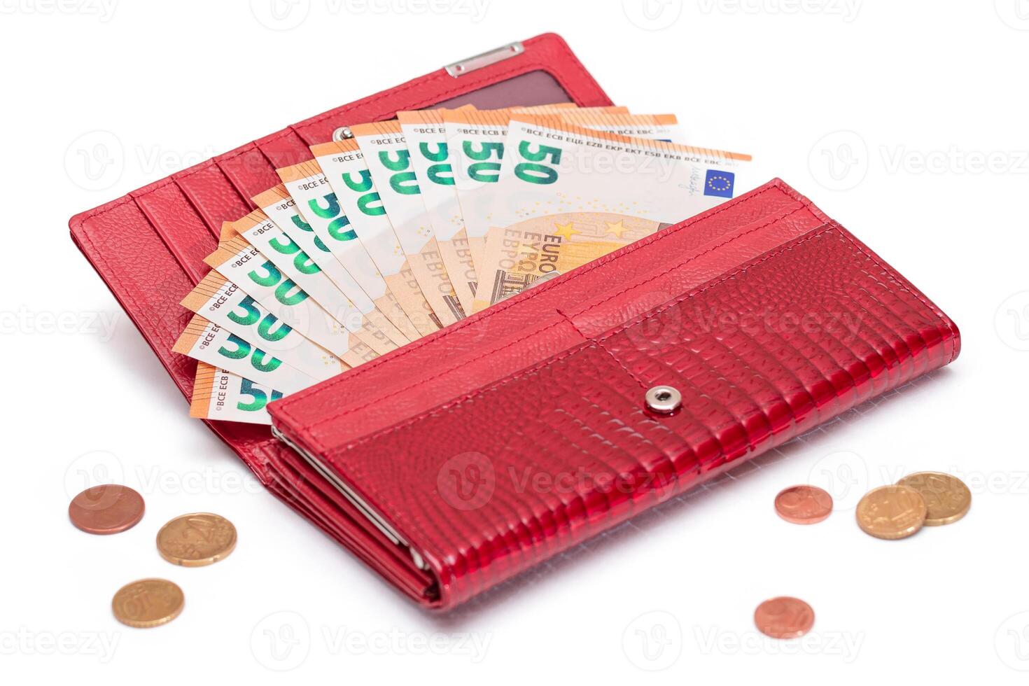 Opened Red Women Purse with 50 Euro Banknotes Inside and Scattered Euro Cent Coins - Isolated on White Background. A Wallet Full of Money Symbolizing Wealth, Success, Shopping and Social Status - Isolation photo