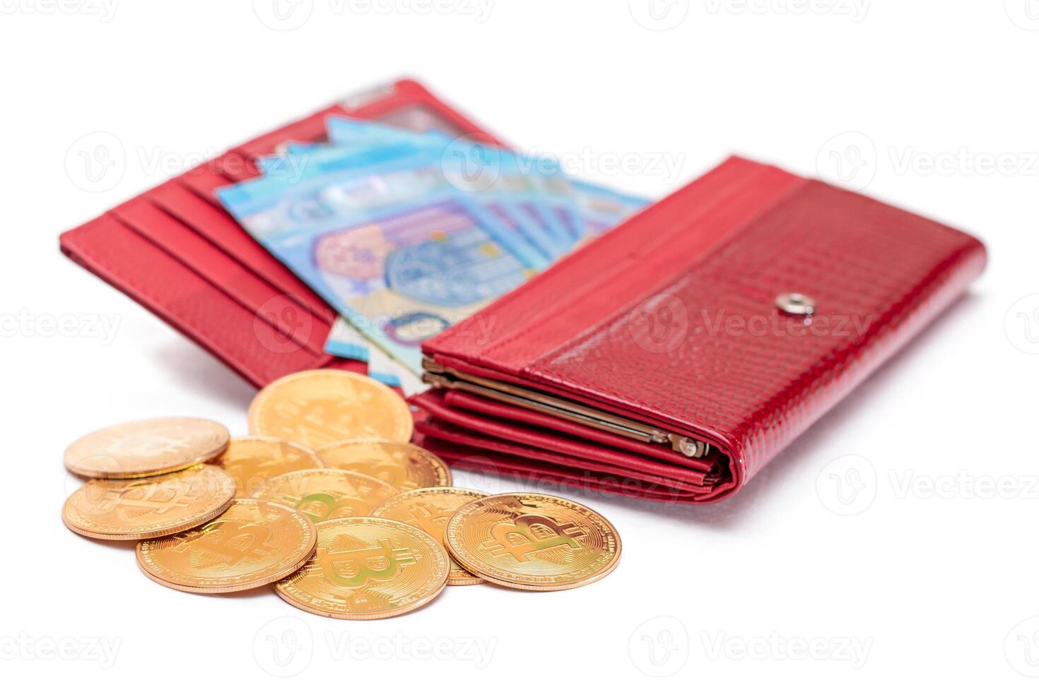Opened Red Women Purse with 20 Euro Banknotes Inside and Bitcoin Coins - Isolated on White Background. A Wallet Full of Money Symbolizing Wealth, Success, Shopping and Social Status - Isolation photo