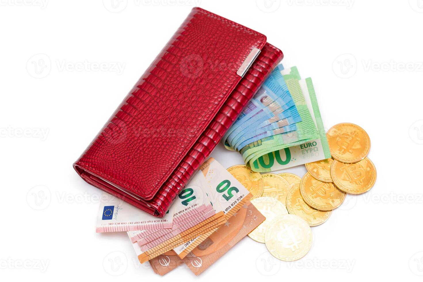 Red Leather Women Purse with Different Euro Banknotes and Bitcoin Coins - Isolated on White Background. A Wallet Full of European Union Paper Money Symbolizing Wealth and Success - Isolation photo