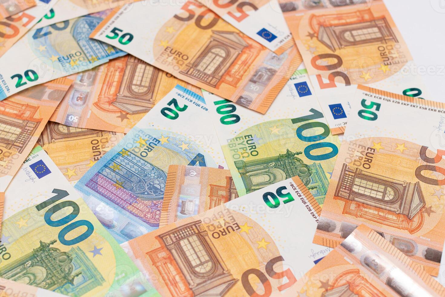 Different Euro Banknotes Money Background. Euro Money Currency. Colored Paper Money. A Lot of Fifty Euro Bills. Business, Finances, Cash and Money Saving Concept photo
