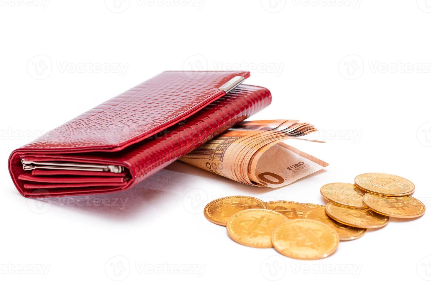 Red Leather Women Purse with Fifty Euro Banknotes and Bitcoin Coins - Isolated on White Background. A Wallet Full of 50 Euro Paper Money Symbolizing Wealth, Success and Social Status - Isolation photo