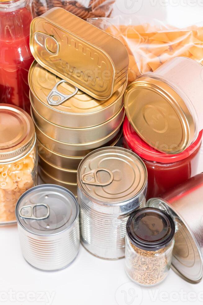 Food Reserves. Canned Food, Spaghetti, Pate, Tuna, Tomato Juice, Pasta, Fish and Grocery. Emergency Food Storage in Case of Crisis. Strategic Food Supplies photo