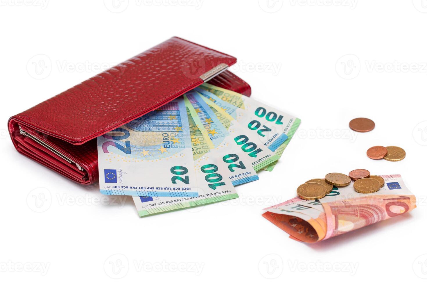 Red Leather Women Purse with Different Euro Banknotes and Euro Cent Coins - Isolated on White Background. A Wallet Full of European Union Paper Money Symbolizing Wealth and Success - Isolation photo