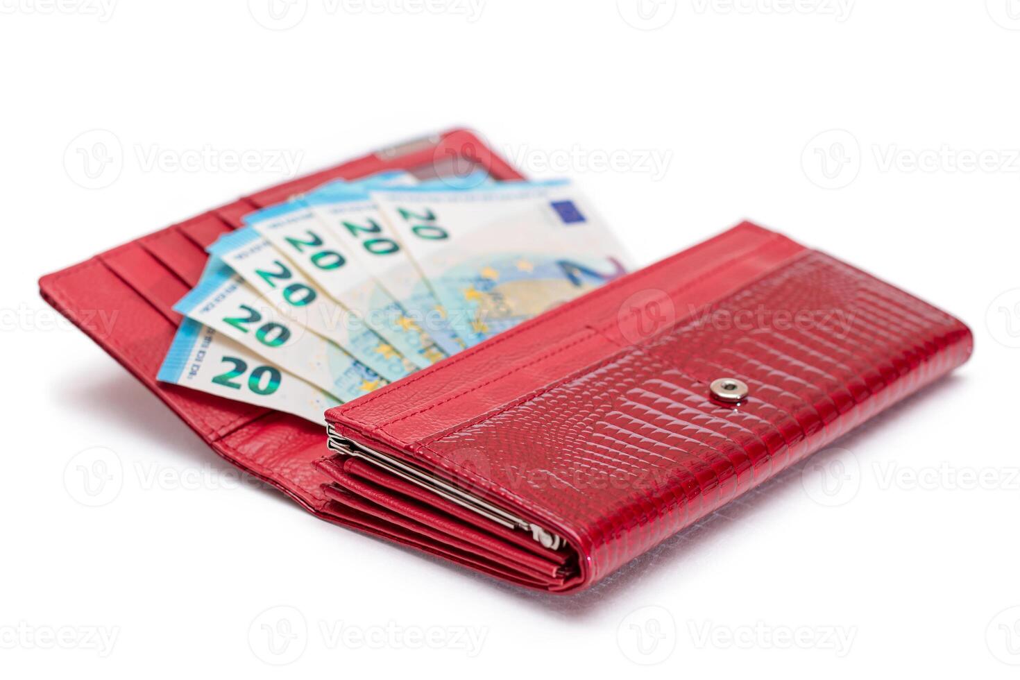 Opened Red Women Purse with 20 Euro Banknotes Inside - Isolated on White Background. A Wallet Full of Money Symbolizing Wealth, Success, Shopping and Social Status - Isolation photo