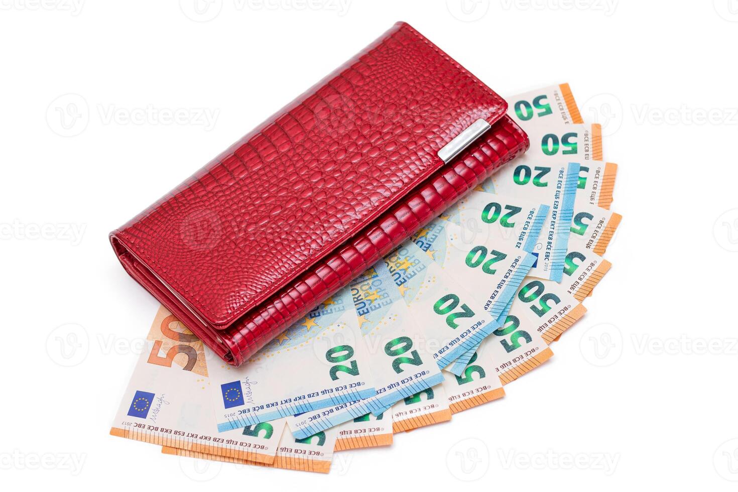 Red Leather Women Purse with Different Euro Banknotes - Isolated on White Background. A Wallet Full of European Union Paper Money Symbolizing Wealth, Success and Social Status - Isolation photo