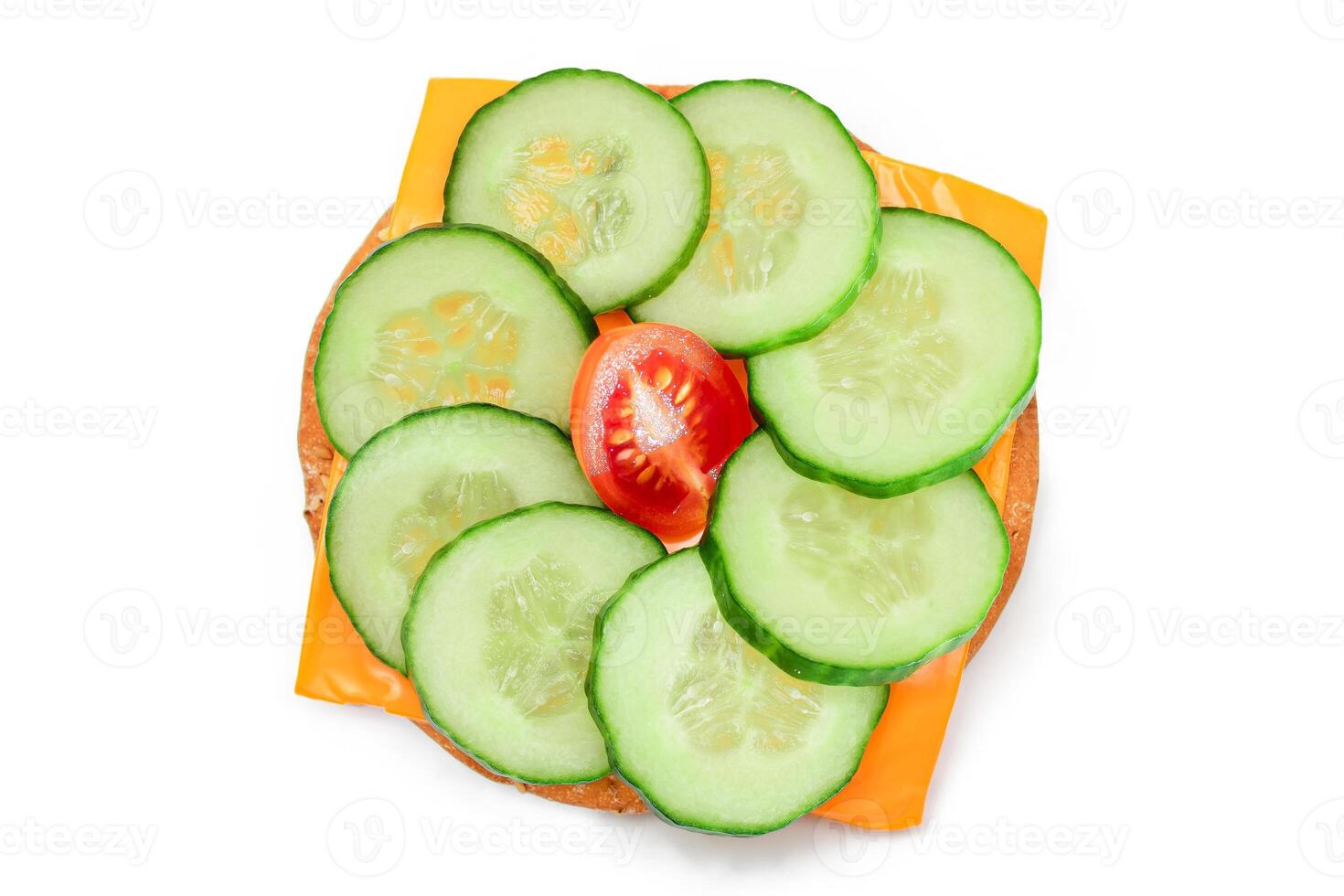 Crispy Cracker Sandwich with Fresh Cucumber, Tomato Cherry and Cheese - Isolated on White. Easy Breakfast. Quick and Healthy Sandwich. Crispbread with Tasty Filling. Healthy Dietary Snack - Isolation photo