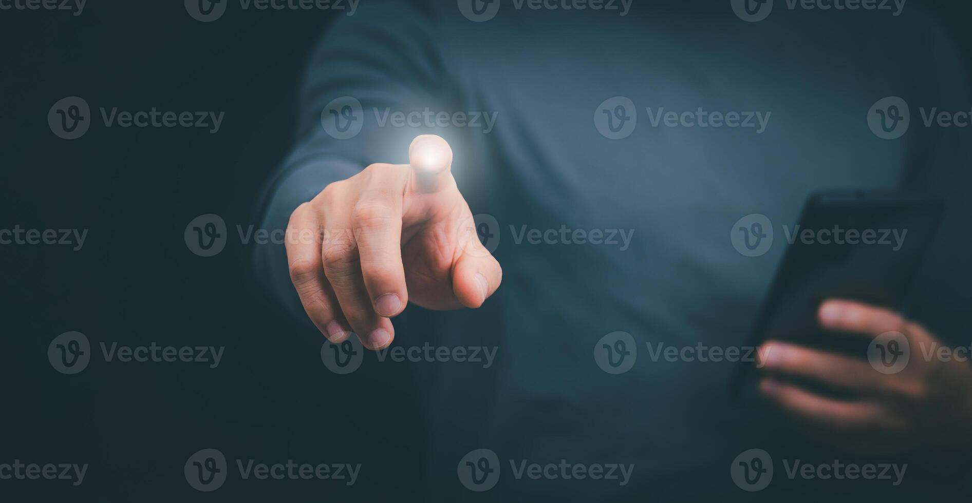Businessman showing using smartphones at fingertips with internet technology, concept of global data connectivity with internet technology, big data, search for information, online marketing photo