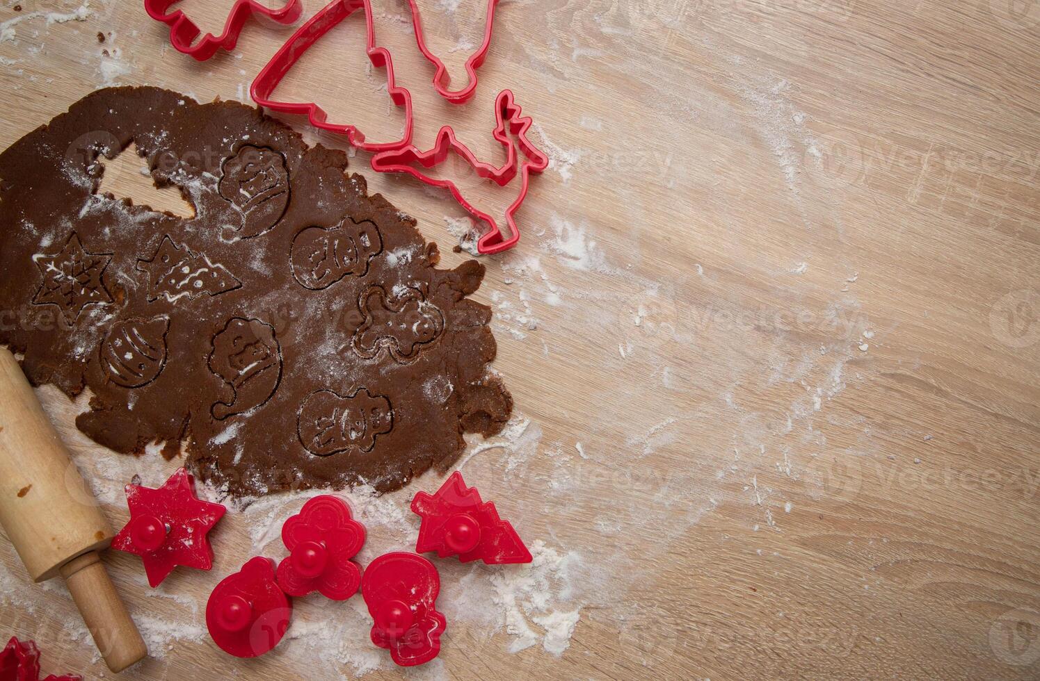 Gingerbread dough for Christmas cookies and cookie cutters.Christmass card and advent calendar concept.Copy space. High quality photo