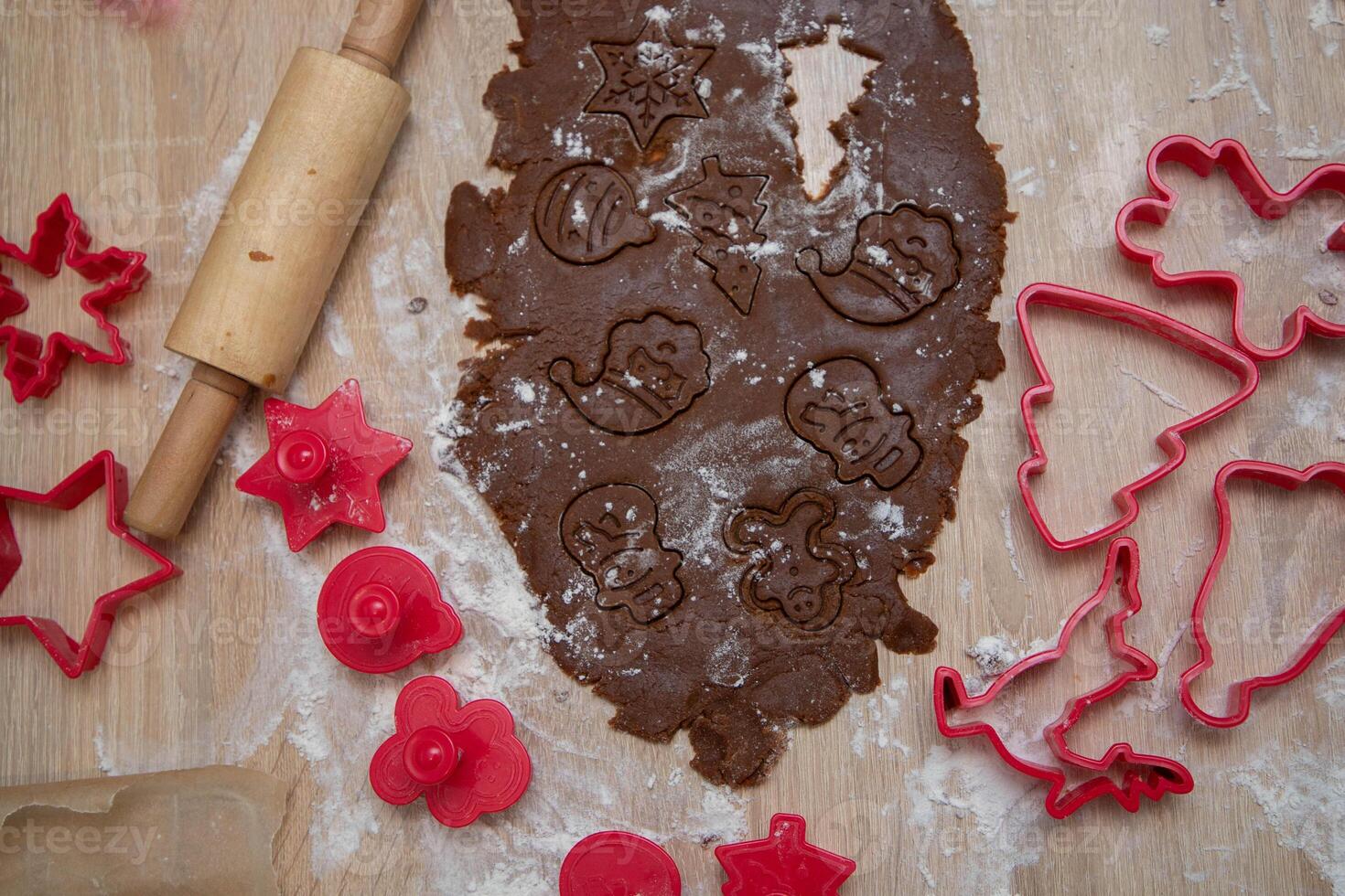 Gingerbread dough for Christmas cookies and cookie cutters.Christmass card and advent calendar concept. Top view.High quality photo