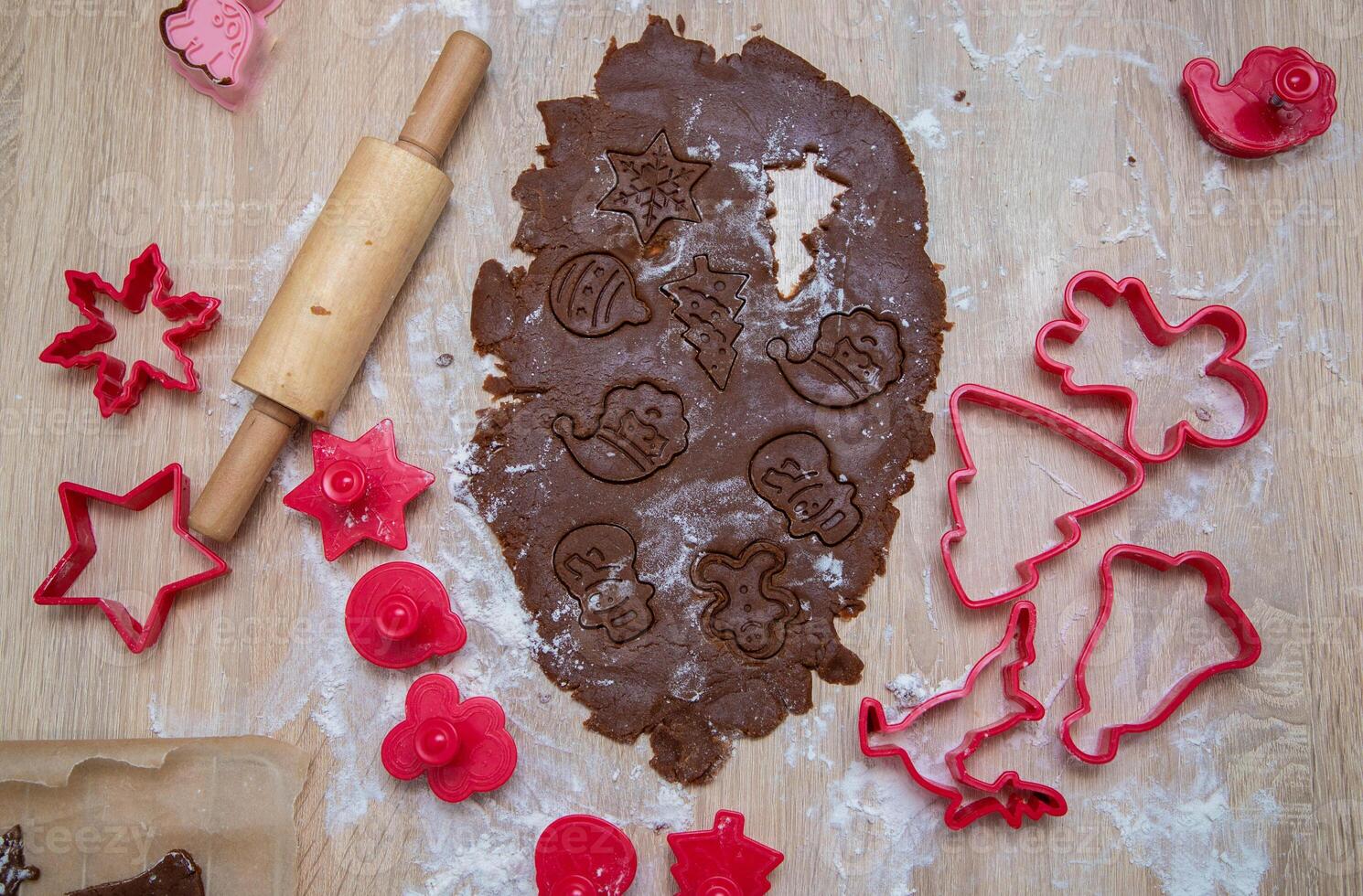 Gingerbread dough for Christmas cookies and cookie cutters.Christmass card and advent calendar concept.Top view.Top view. High quality photo