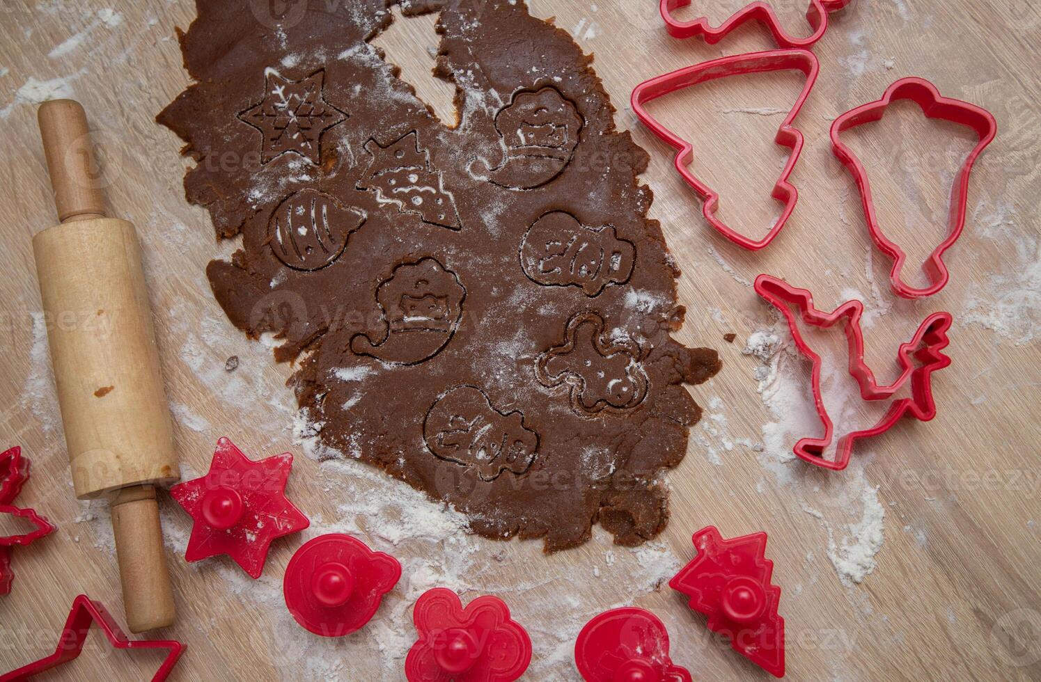 Gingerbread dough for Christmas cookies and cookie cutters.Christmass card and advent calendar concept. Close up.Top view.High quality photo
