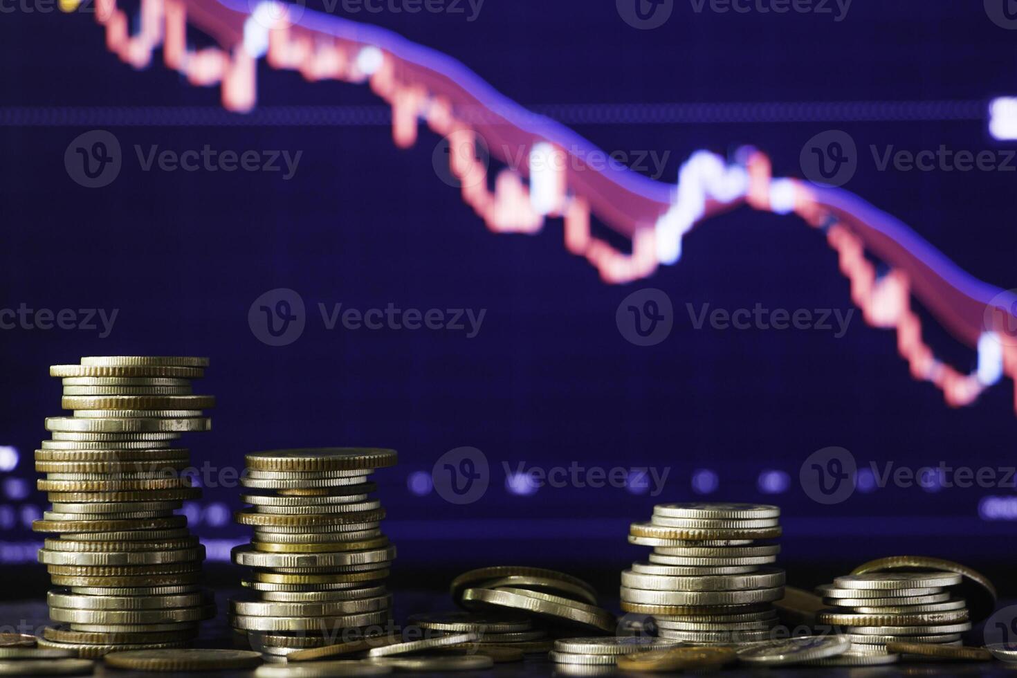 Coins stack and stock market investment graph,concept of business investment, stock future trading , clash and bear market. photo