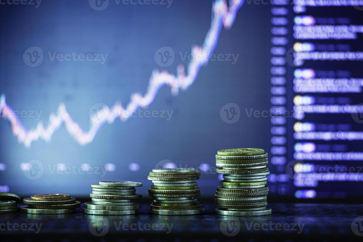 Coins stack and stock market investment graph,concept of business investment and stock future trading. photo