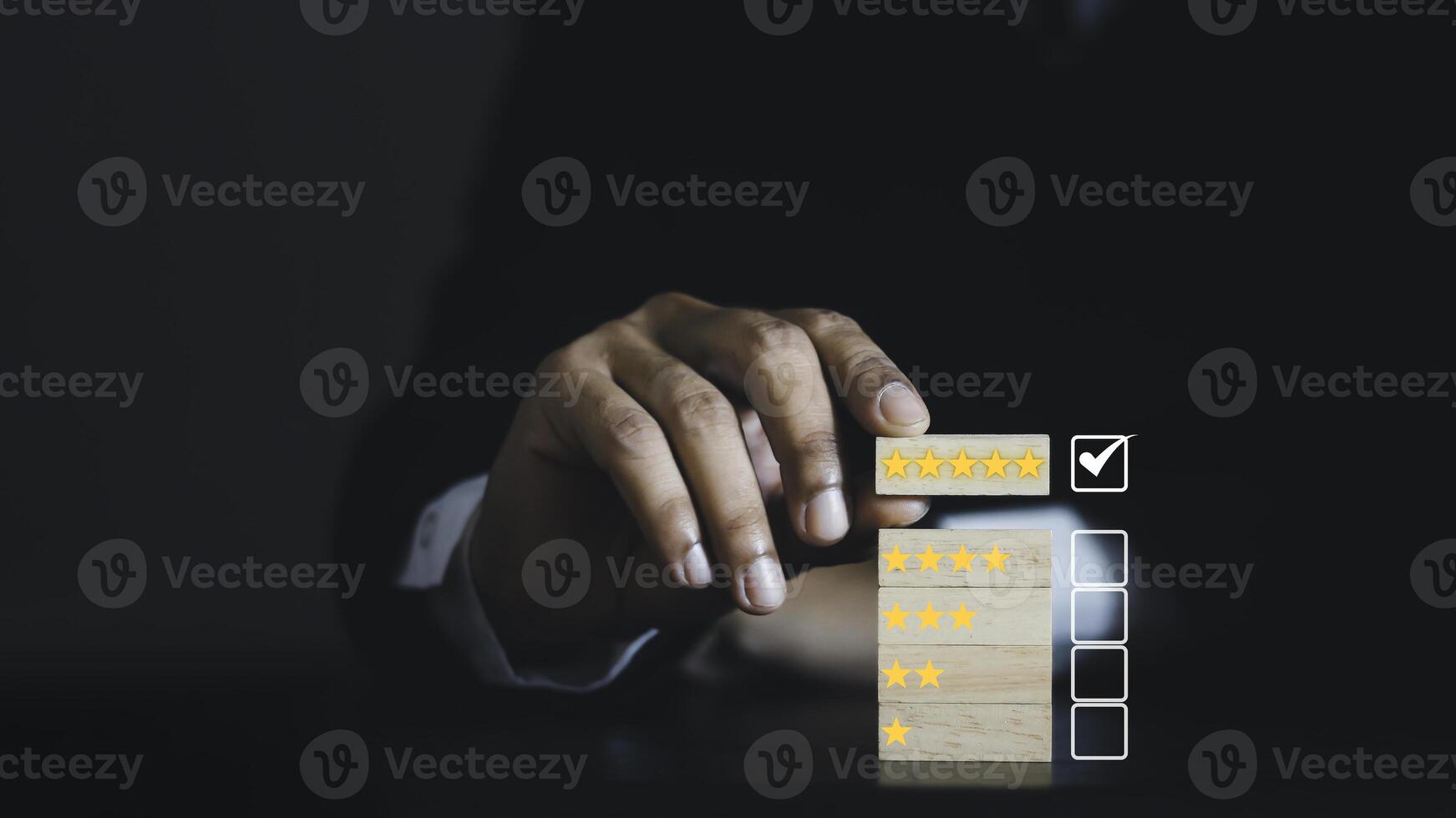 Business people are Choosing wood block with 5 star icon to give satisfaction in service. Feedback rating and positive customer review experience, service and Satisfaction. photo