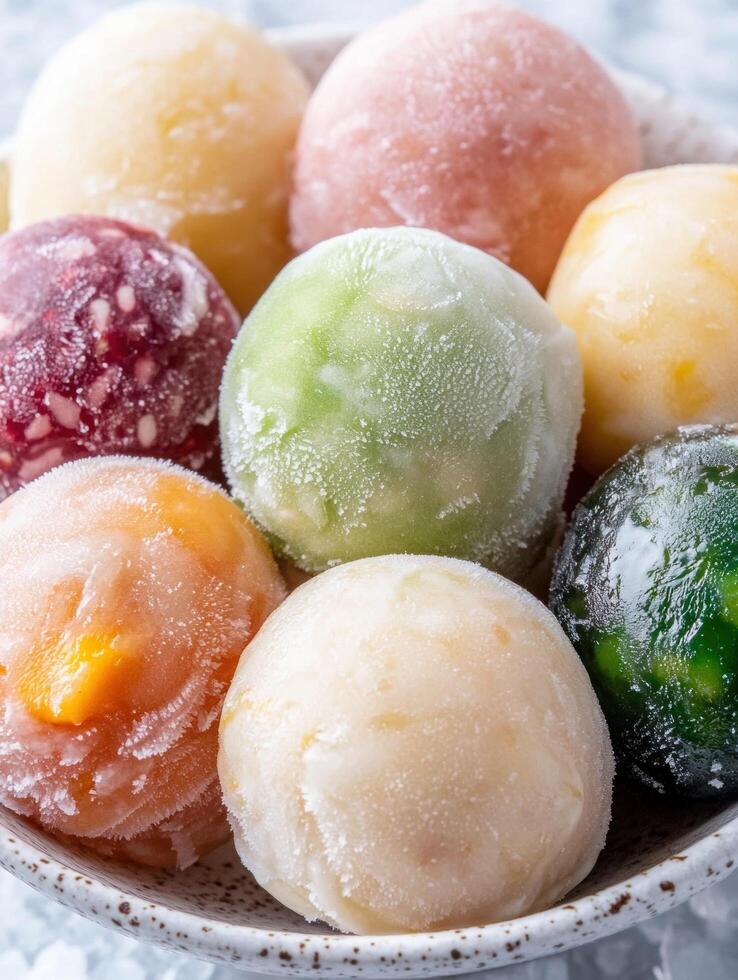 Assortment of colorful frozen fruit balls photo