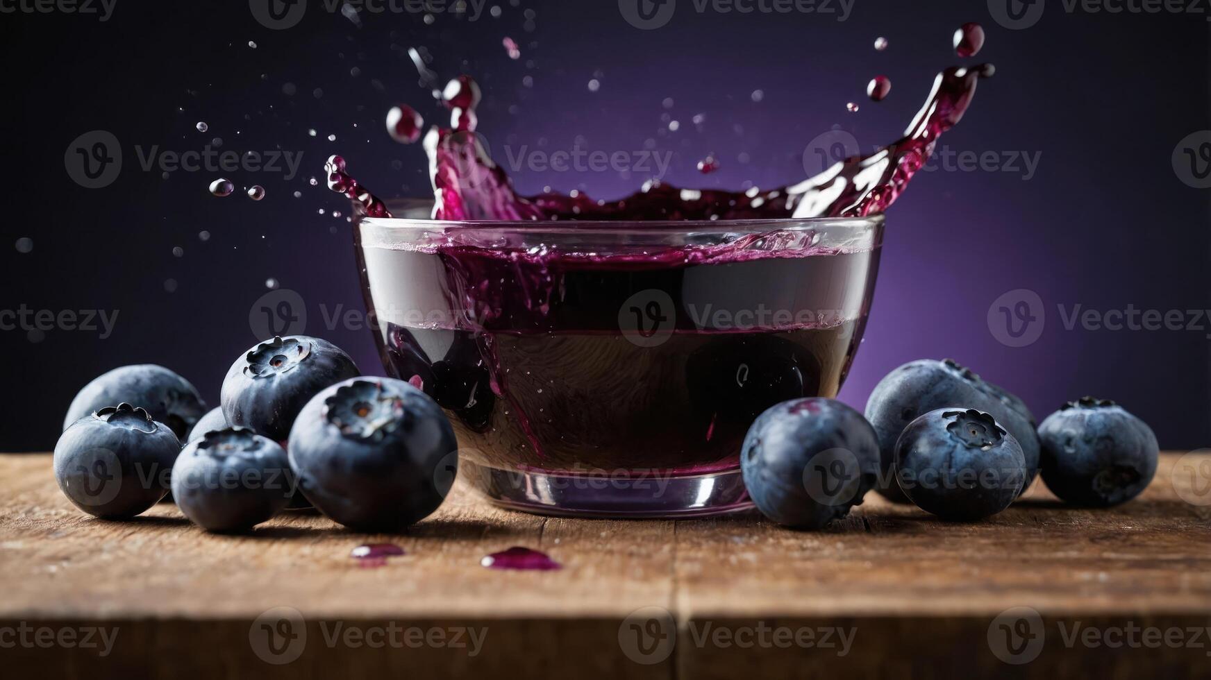 A bowl of blueberry juice with splashes, surrounded by fresh blueberries on a wooden surface. photo