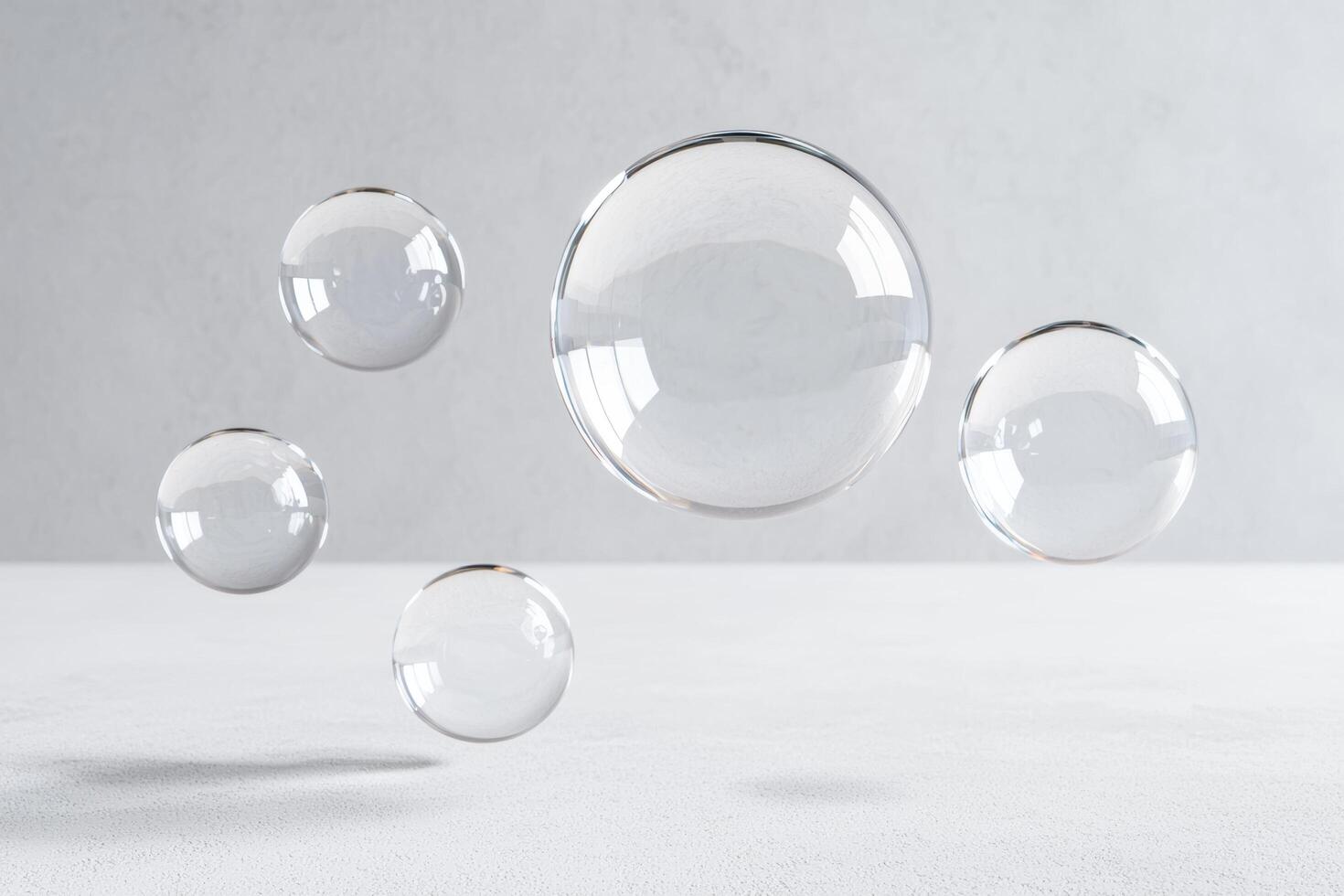 Transparent glass spheres floating in the air photo