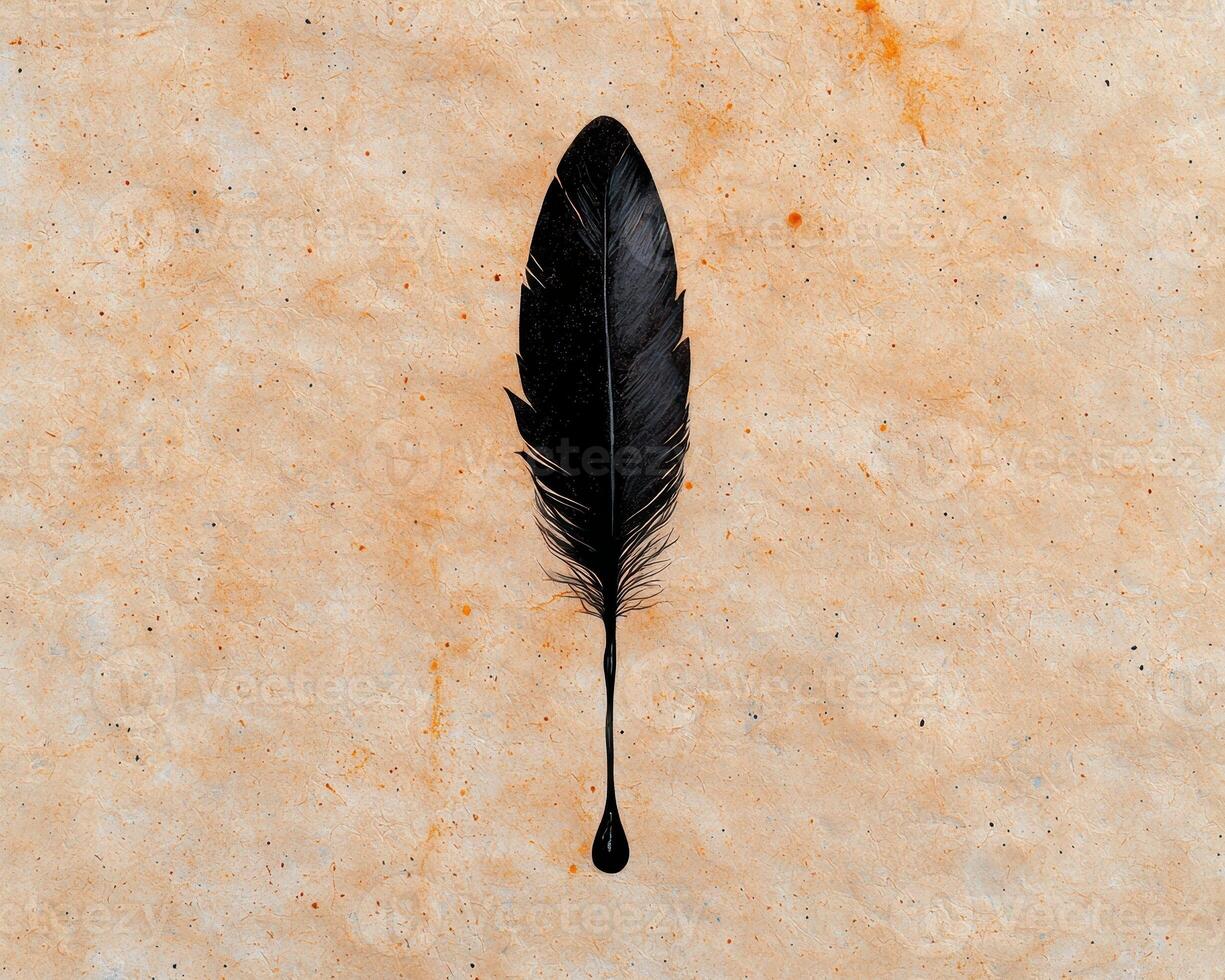 black feather with ink drop on textured background photo