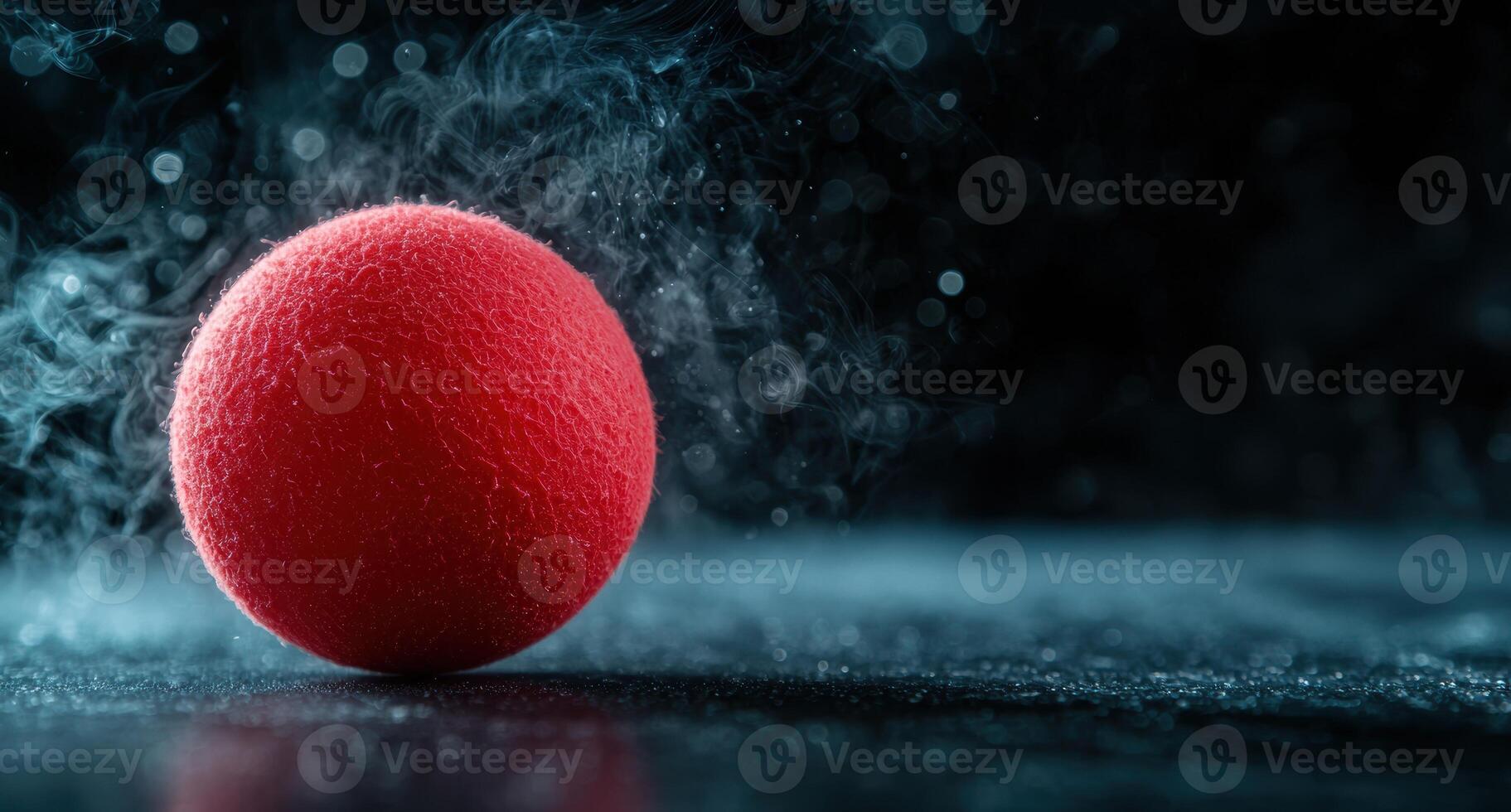 Vibrant red ball in smoky atmosphere photo