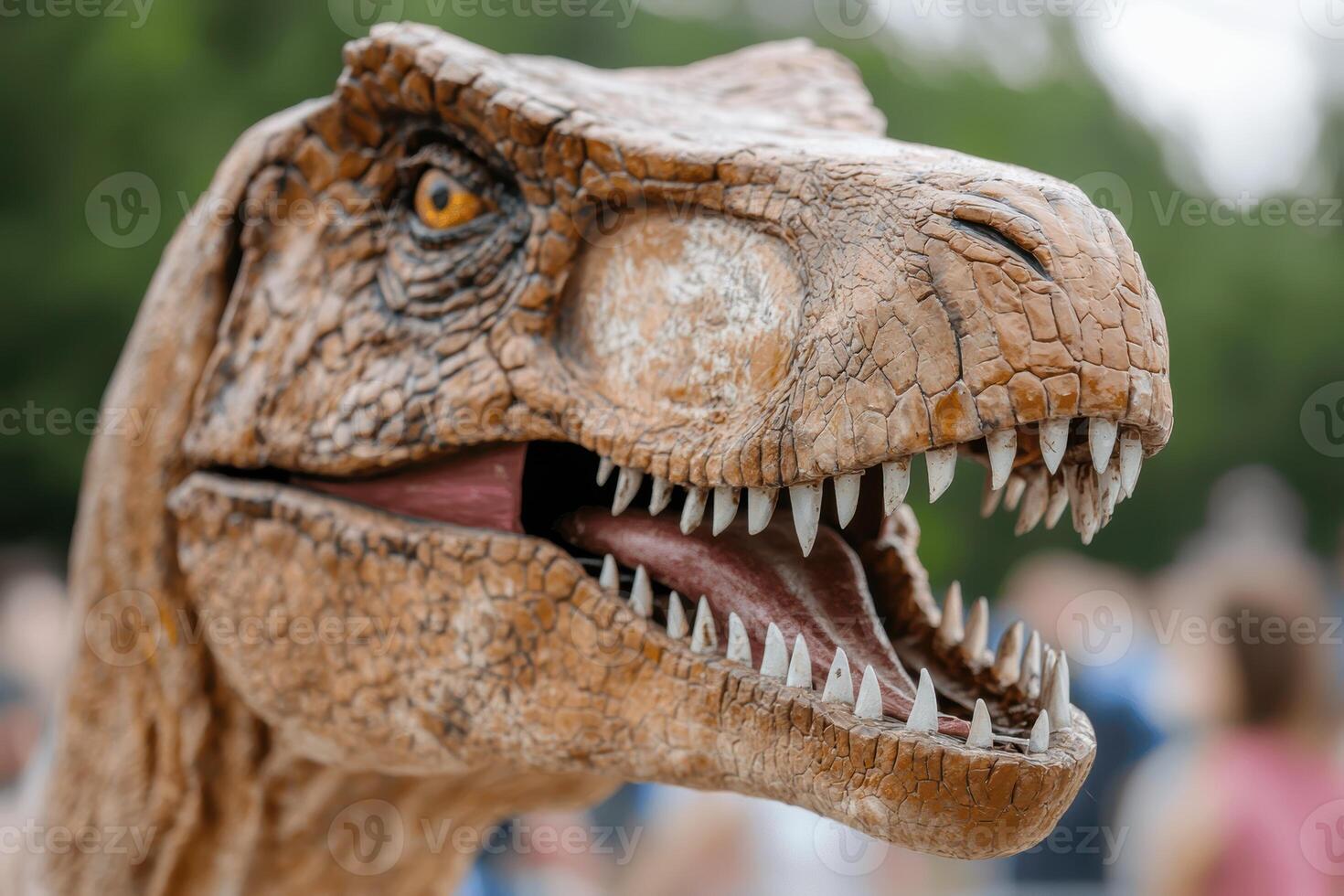 Realistic dinosaur model with open mouth and sharp teeth photo