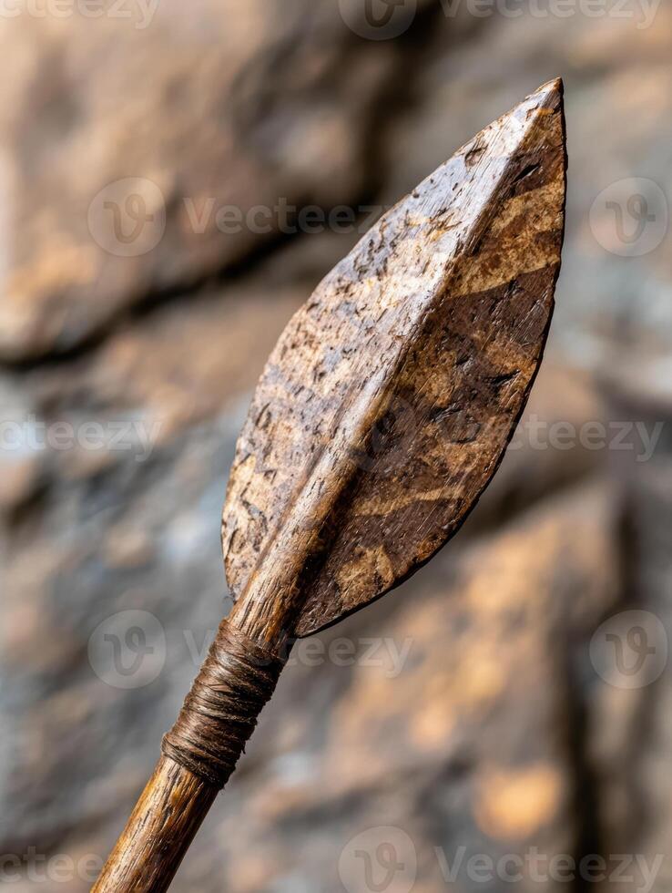 Weathered wooden arrow pointing upward photo