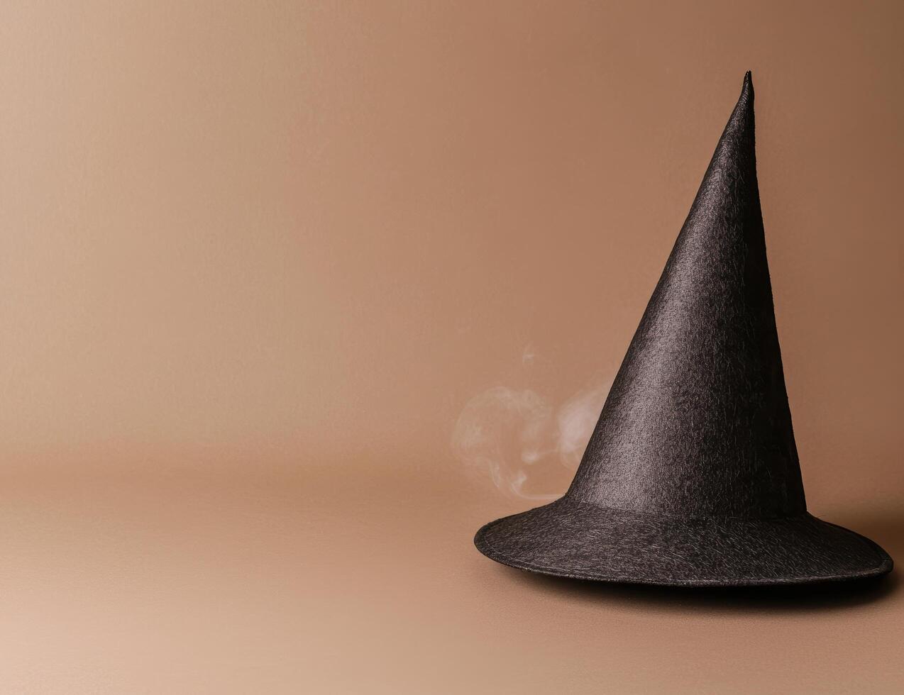 Mysterious witchs hat with smoke photo