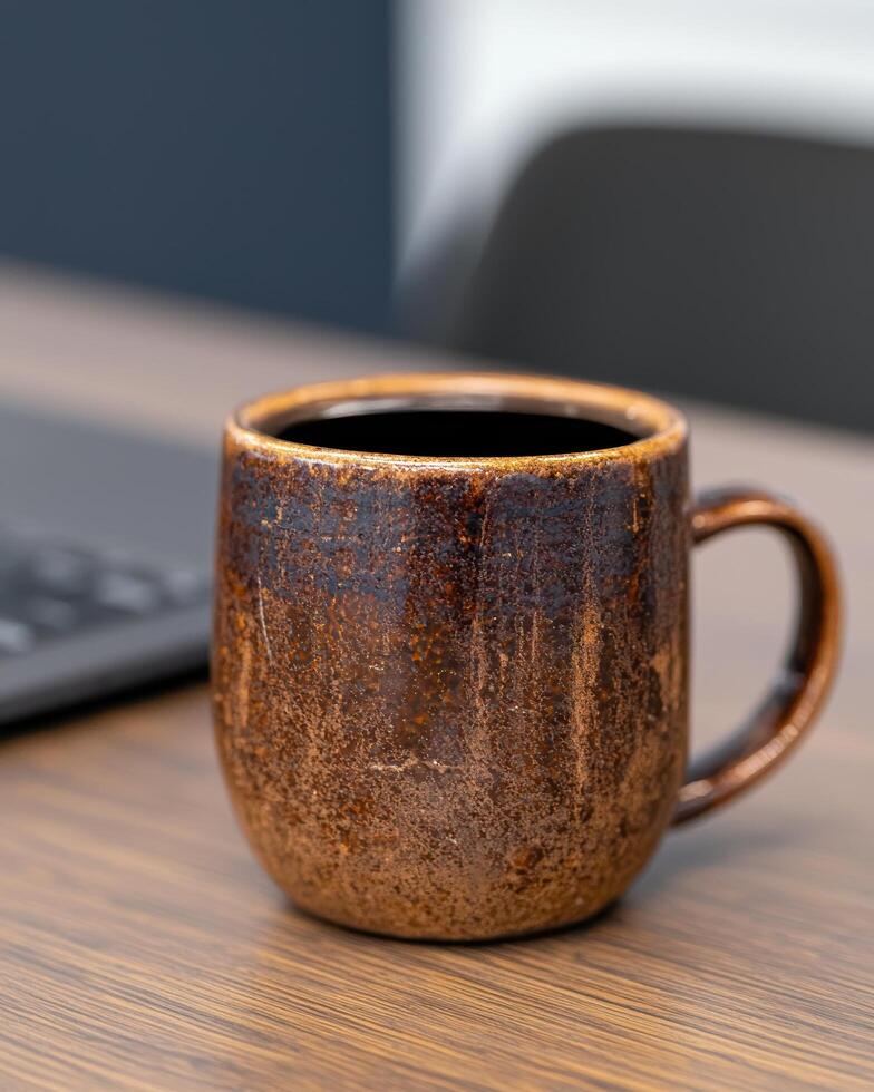 Rustic ceramic coffee mug on wooden table photo