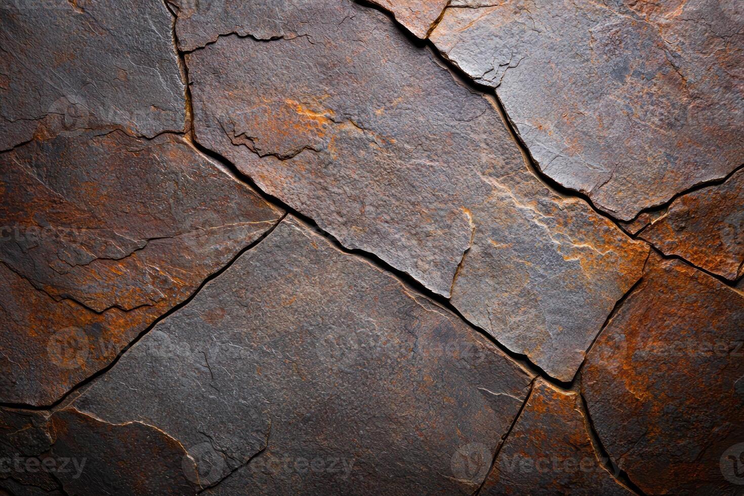 Rugged rock surface with natural patterns and textures photo
