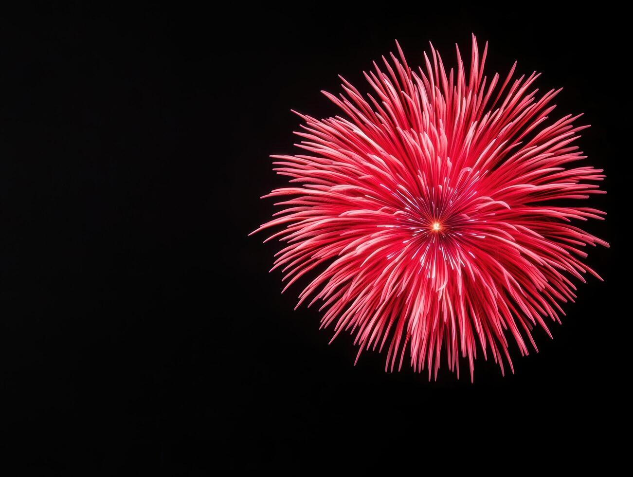 Vibrant fireworks display against a dark night sky photo