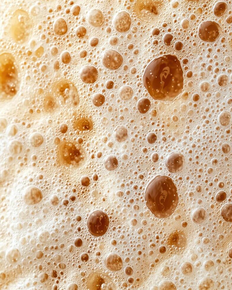 Close up of bubbly beer or ale photo