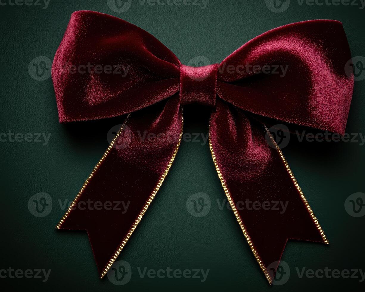 Elegant red velvet bow with golden trim photo