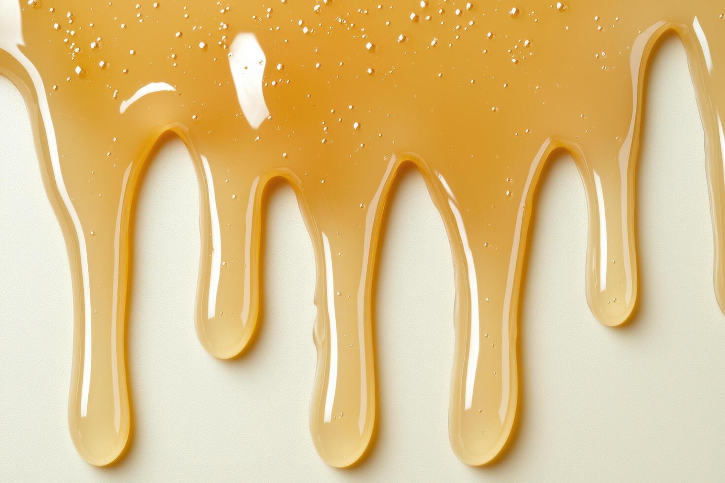 Dripping honey texture background photo