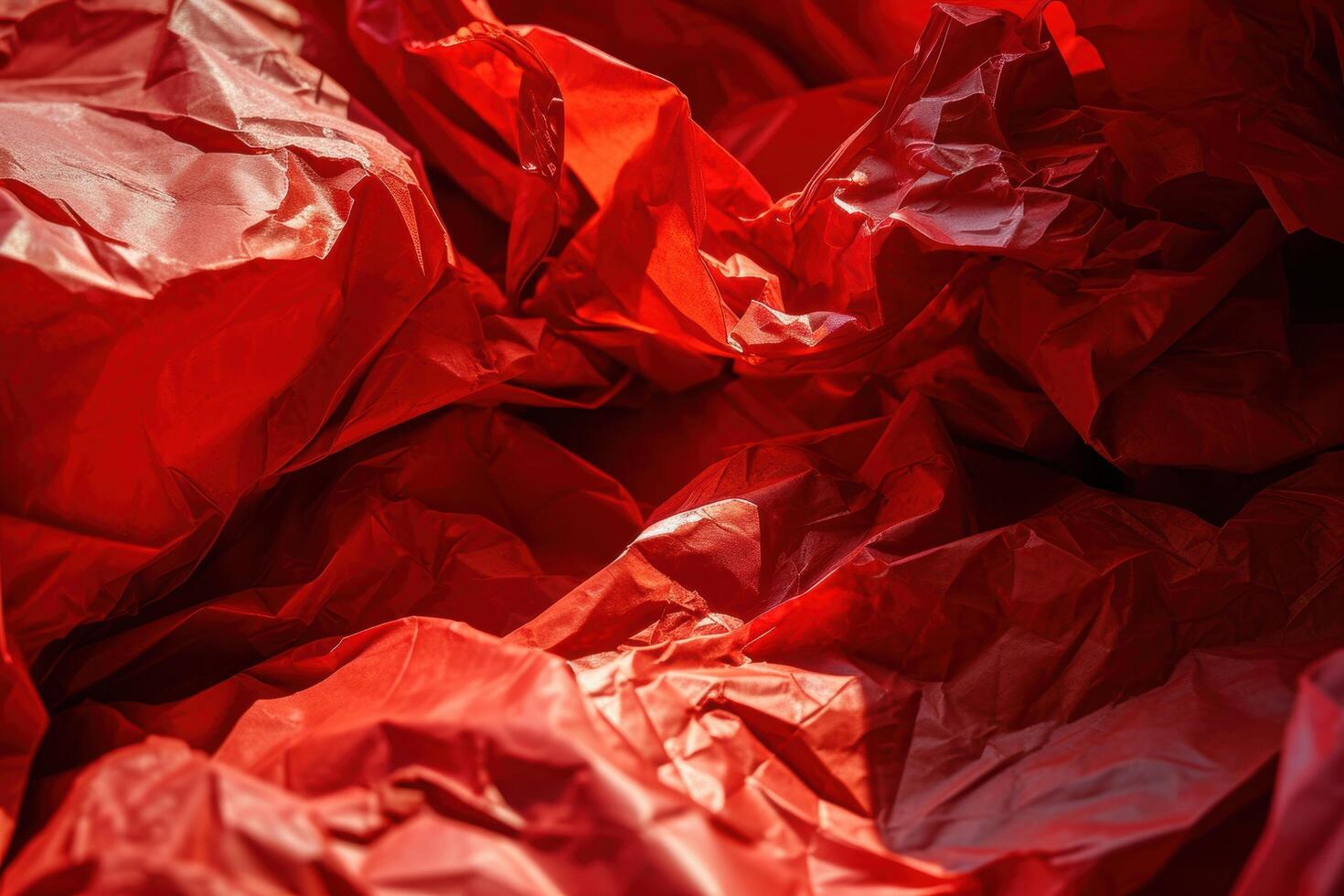 Crumpled red plastic background photo