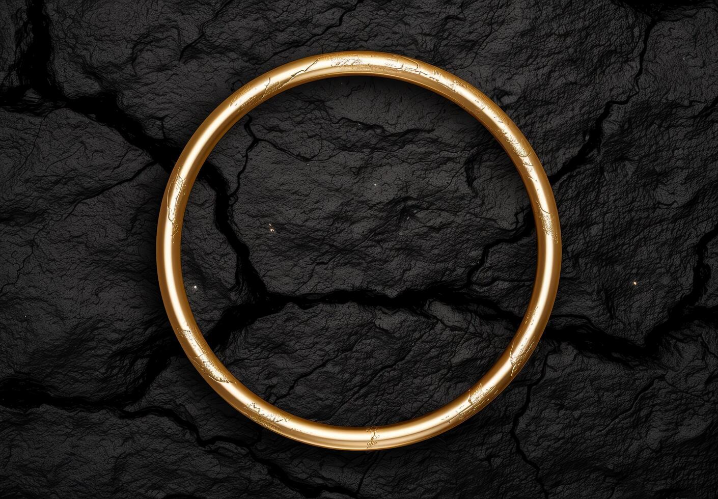 golden ring on dark slate background photo