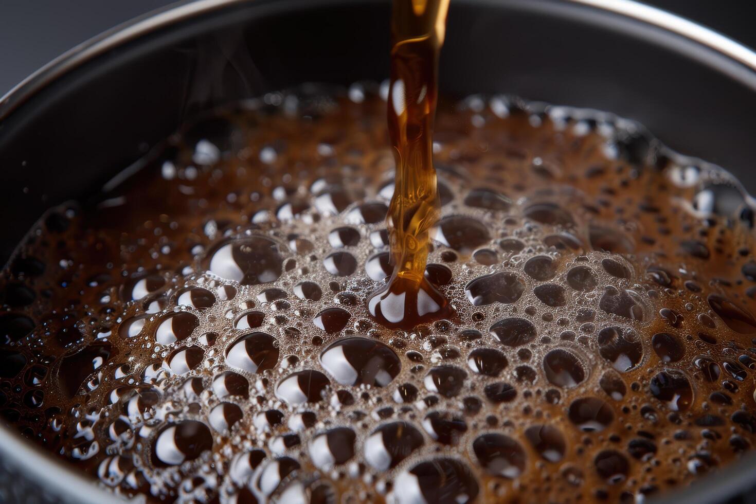 Close up of foaming beer being poured into a glass photo