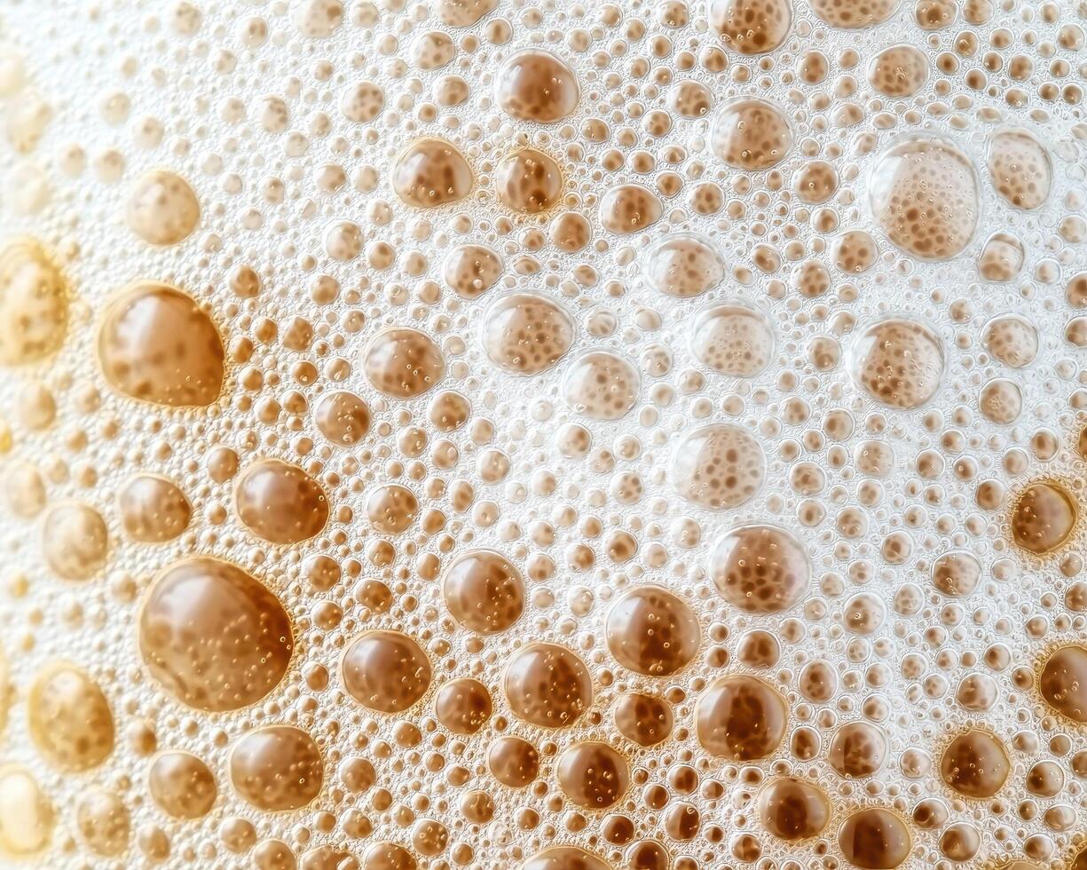 Macro shot of beer foam and bubbles photo