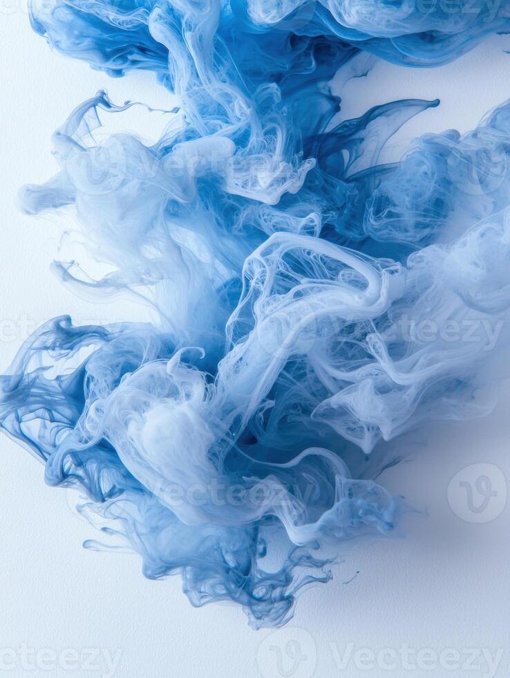 Swirling blue smoke abstract background photo