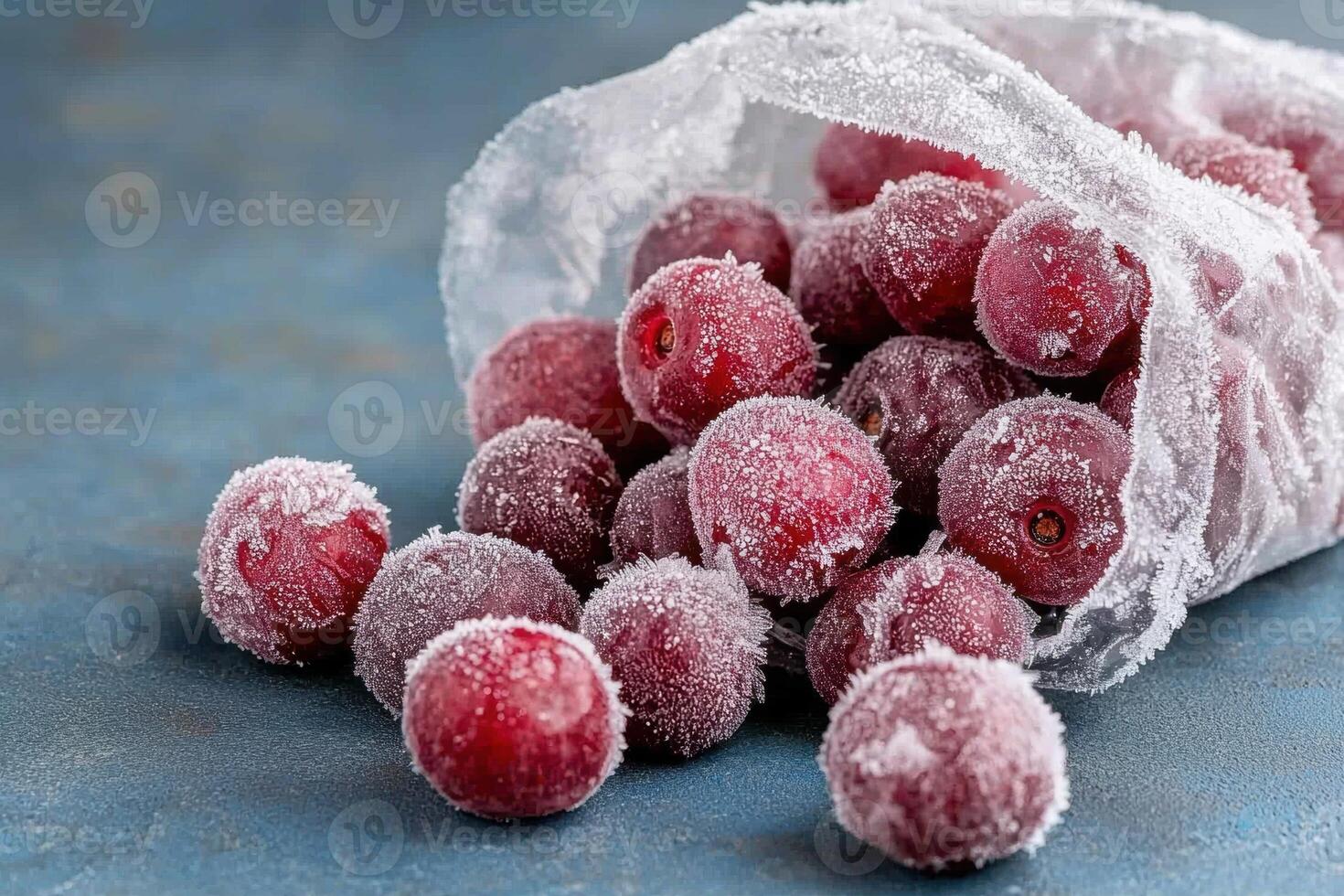 Frozen red grapes covered in frost photo