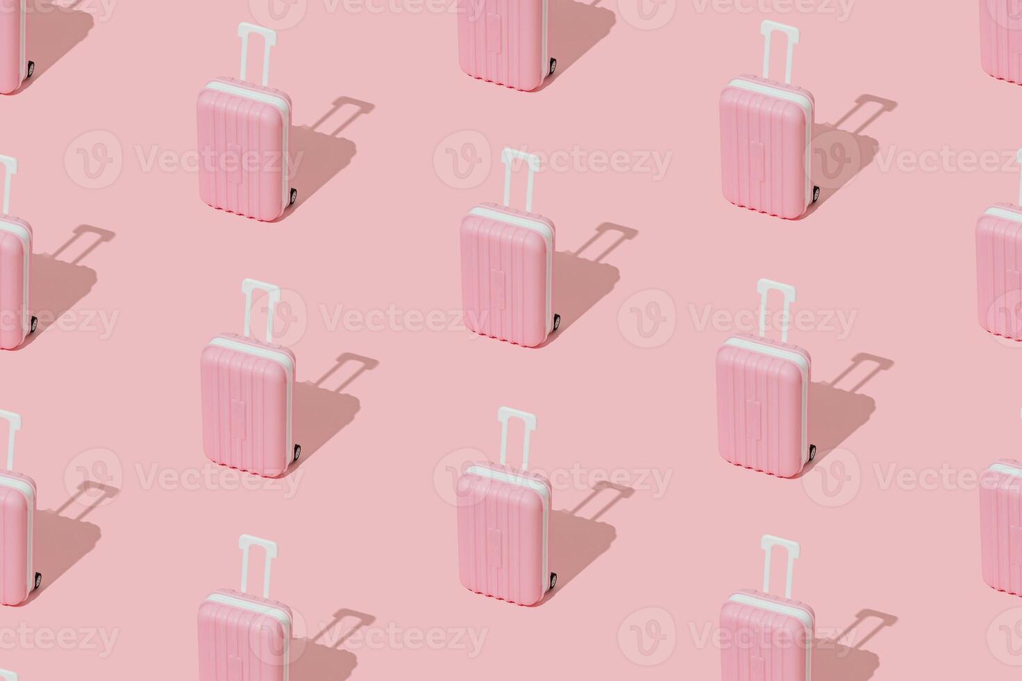 Trendy pattern made of pink suitcase on pastel pink background. Minimal travel concept. Trendy vacation idea. photo