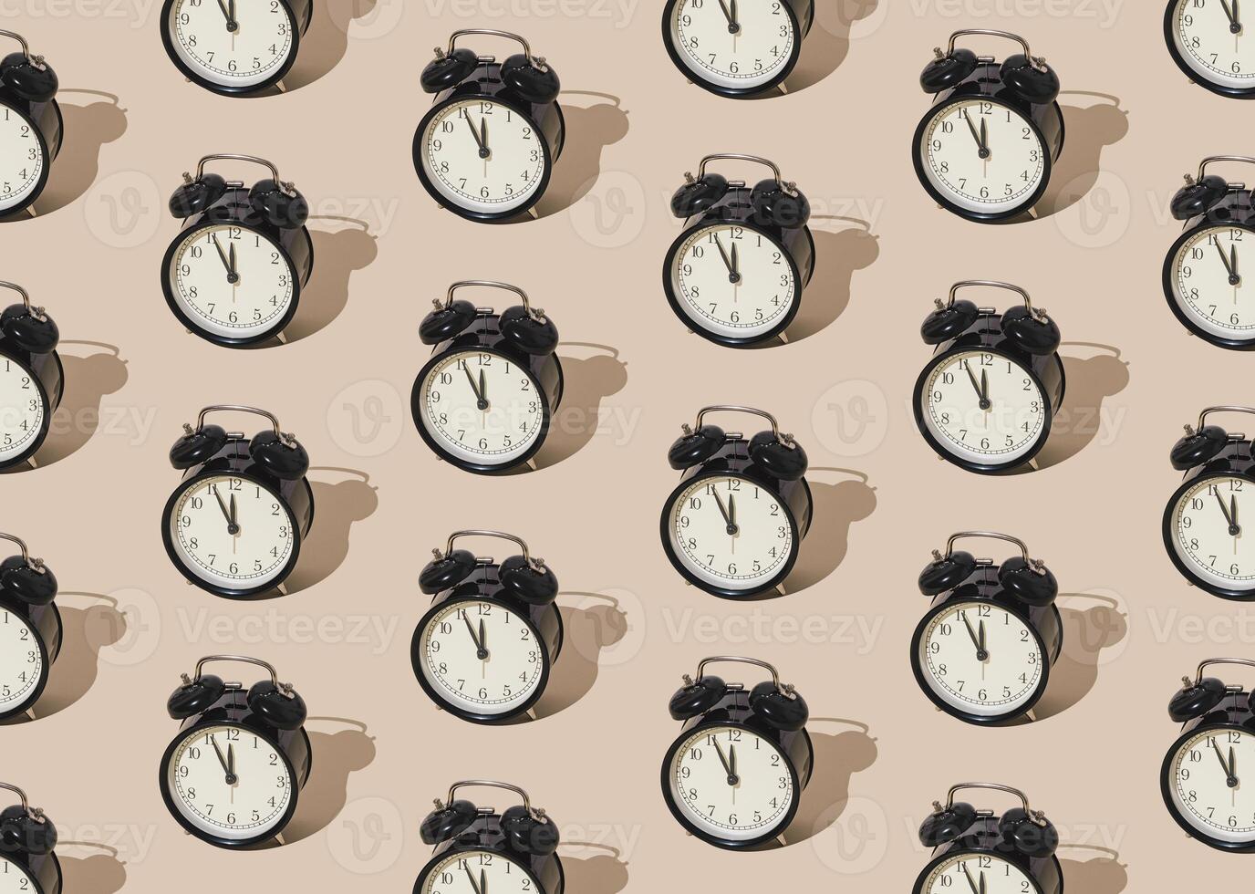 Trendy sunlight pattern made with retro alarm clock on pastel cream background. Minimal time concept. photo
