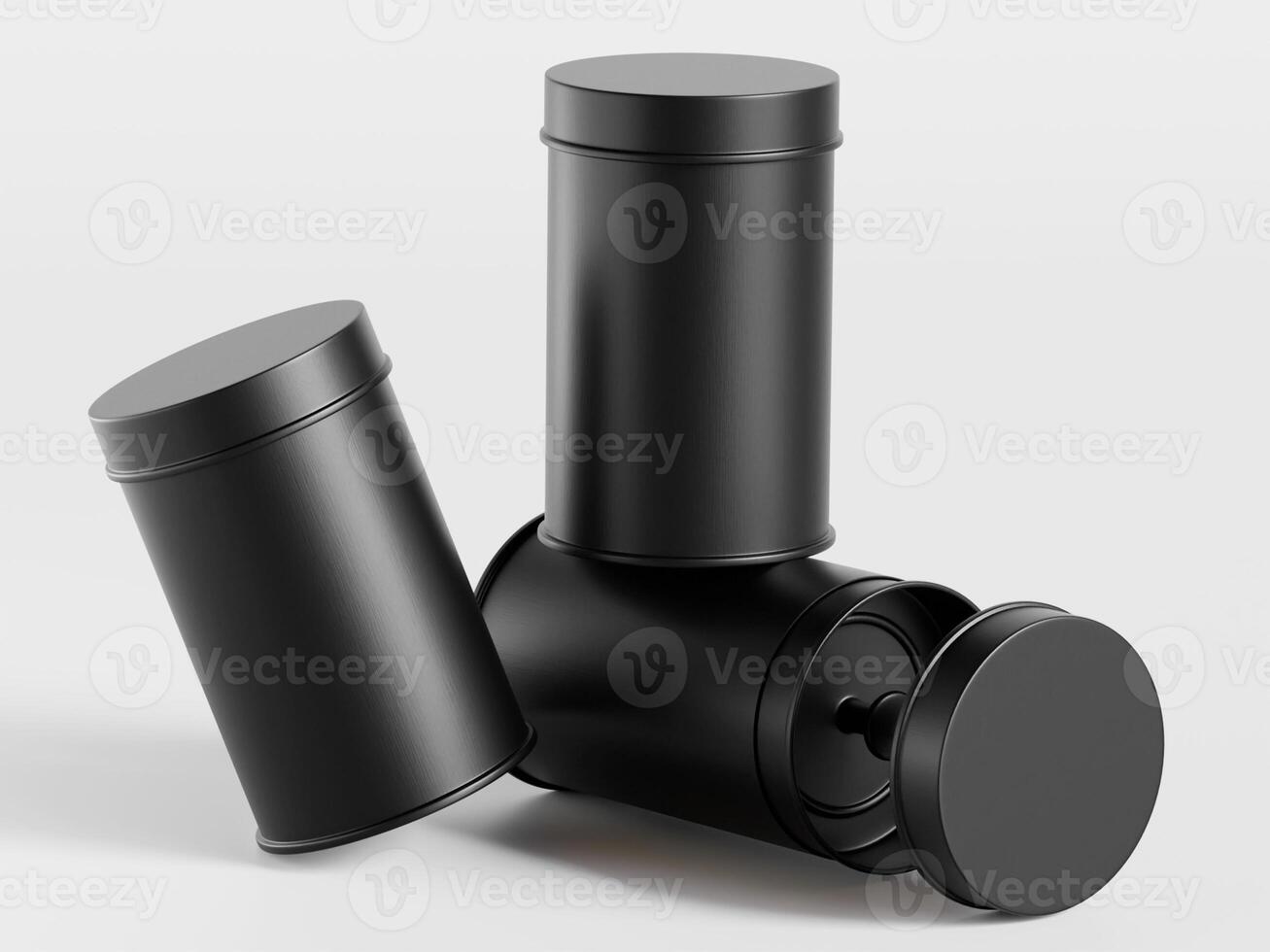 Three black containers with lids on a white surface photo