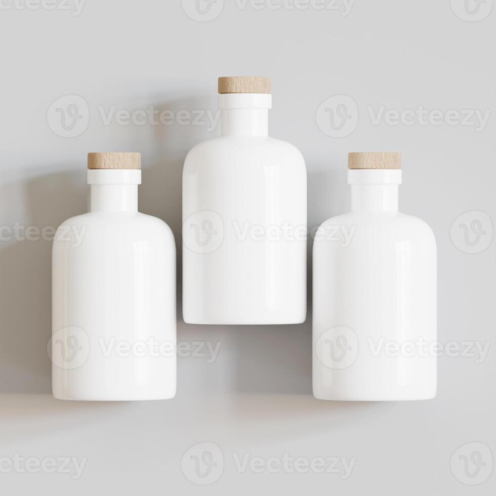 Three white bottles with wooden lids on a gray background photo