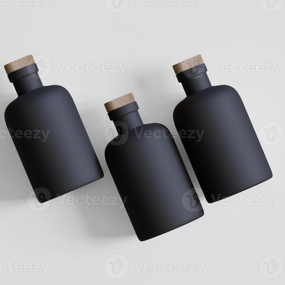 Three black bottles with wooden lids on a white surface photo