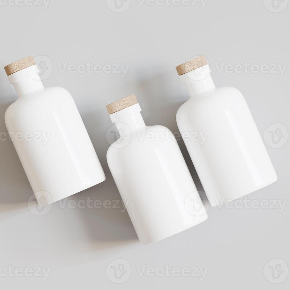 Three white bottles with wooden lids on a gray surface photo