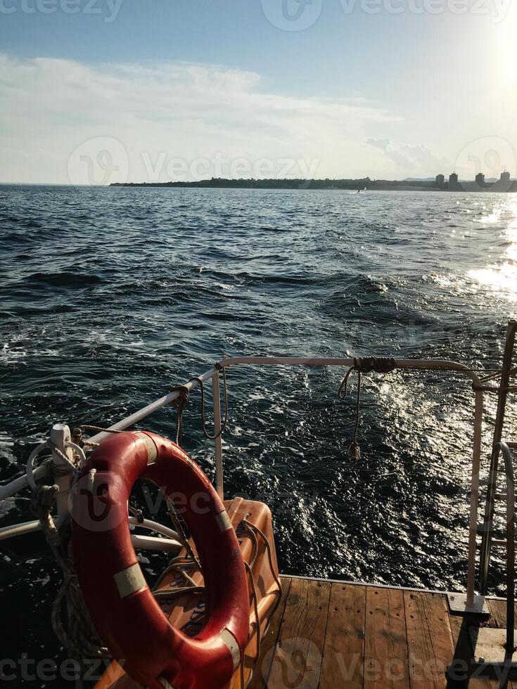 Serene boat ride overlooking the shimmering ocean horizon photo