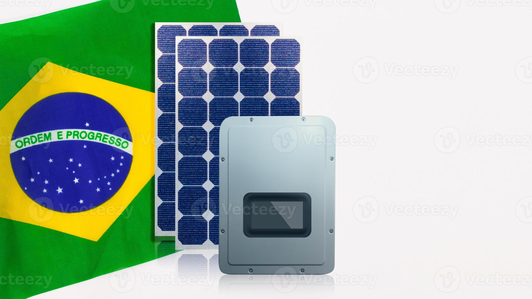 Solar photovoltaic panels, inversor and Brazil Flag isolated on white background. photo